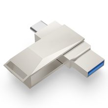 USB-minne i metall med dubbla utskjutbara kontakter för telefoner och datorer