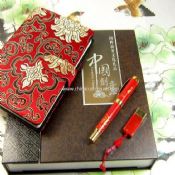 Ensemble disque USB de Chine rouge et plume images